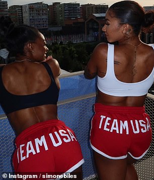 Both gymnasts wore booty shorts with the text 'TEAM USA' printed on them