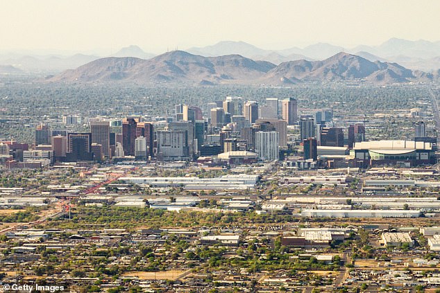 Pictured: An aerial view of the skyline in downtown Phoenix, Arizona, where the cost of a one-bedroom rental home has increased 84 percent over the past five years