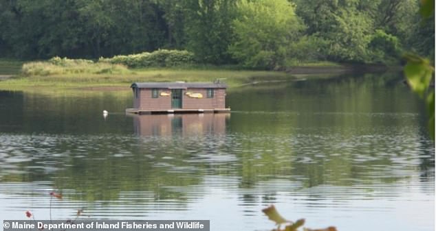 A floating camp is depicted on the Androscoggin River, which flows through New Hampshire and Maine