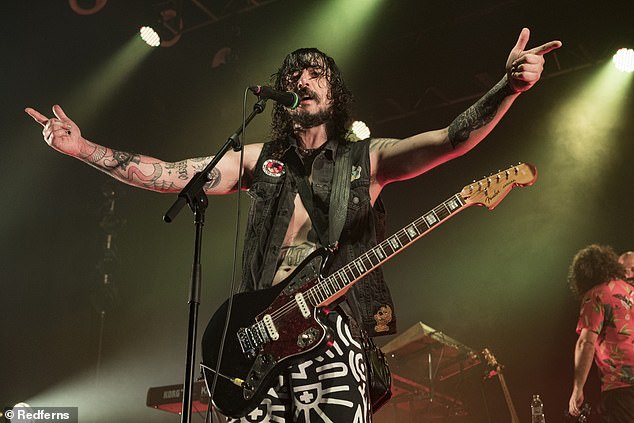 Sticky Fingers frontman Dylan Frost (pictured) has pleaded guilty to allegedly stealing a packet of fried chicken and a bottle of iced coffee from a Woolworths store in Sydney