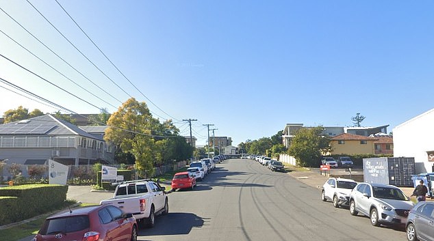 A man has been charged with murder after the body of another man was found in a home in the Brisbane suburb of Stones Corner (pictured) in the early hours of Friday morning