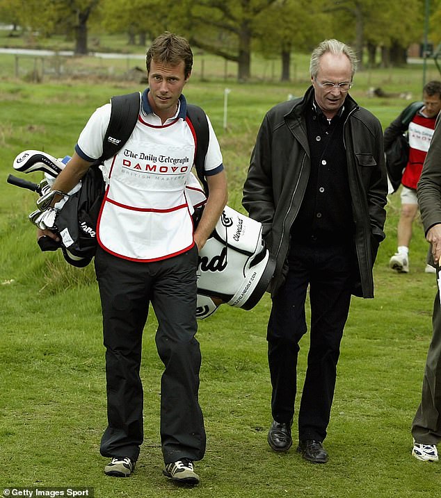 Sven-Goran Eriksson is seen here with his son Johan, who was caddying for Swedish golfer Johan Edfors at a tournament in the Forest of Arden, Warwickshire in May 2004.