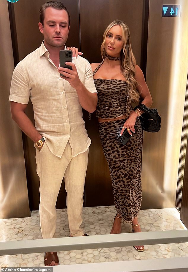 The 31-year-old TOWIE star jetted to the Spanish island earlier this week with her new boyfriend Archie Chandler, 30 (both pictured at Amber's birthday party in Dubai)