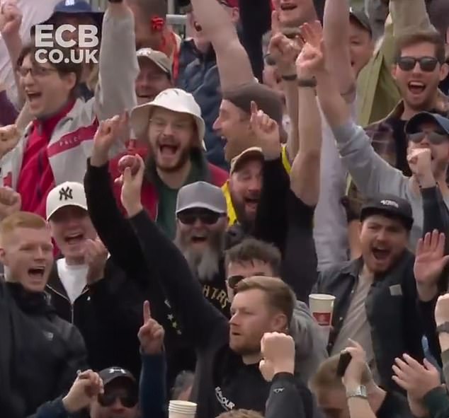 An England supporter made a casual catch while holding four pint cups in his hand