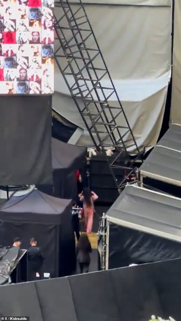 One fan posted a video of a giant box - big enough to fit a person - being wheeled around by two men behind the scenes