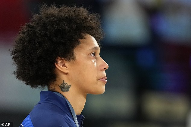 Tears stream down the face of United States' Brittney Griner during the national anthem