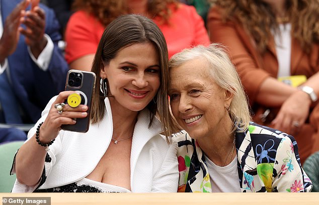 Tennis player Martina Navratilova (right) and her wife Julia Lemigova (left) have adopted two boys