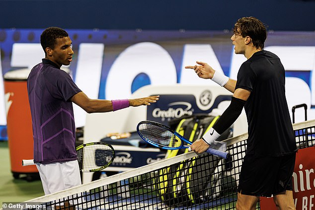 Felix Auger-Aliassime contested the final point of his match against Britain's Jack Draper, right