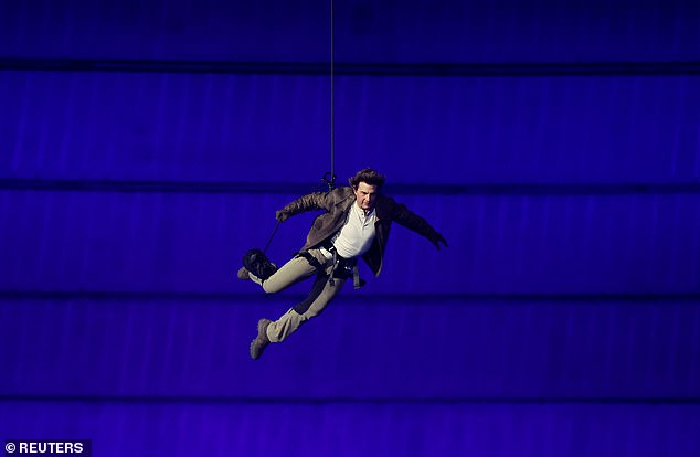 Elsewhere in the closing ceremony, Hollywood legend Tom Cruise jumped from the stadium roof in a death-defying stunt during an extravagant handover ceremony