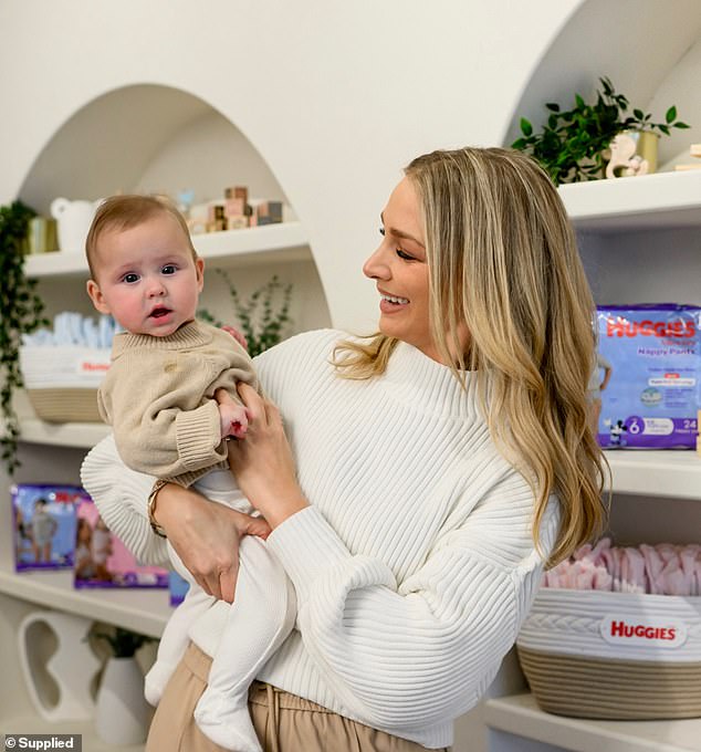 Anna Heinrich revealed a wild new career move on Wednesday as she has partnered with Huggies to launch a pop-up toddler skin spa in Sydney. Pictured with daughter Ruby