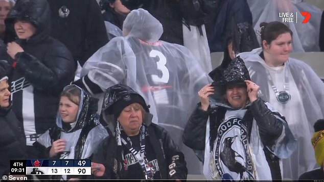 Fans had to sit in the rain as players were escorted off the field due to a lightning strike nearby