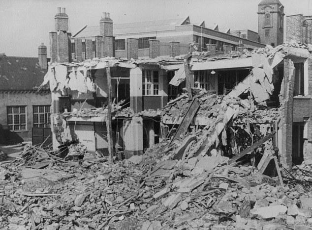 The wreckage of Hallsville School (known as Agate Street Infants), East London, after it was hit in a German air raid, killing 75 people