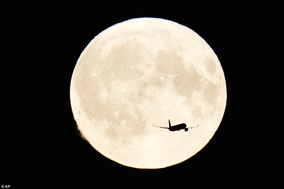 COPENHAGEN: A plane flies past the supermoon over Copenhagen as a blue supermoon arrives in Europe