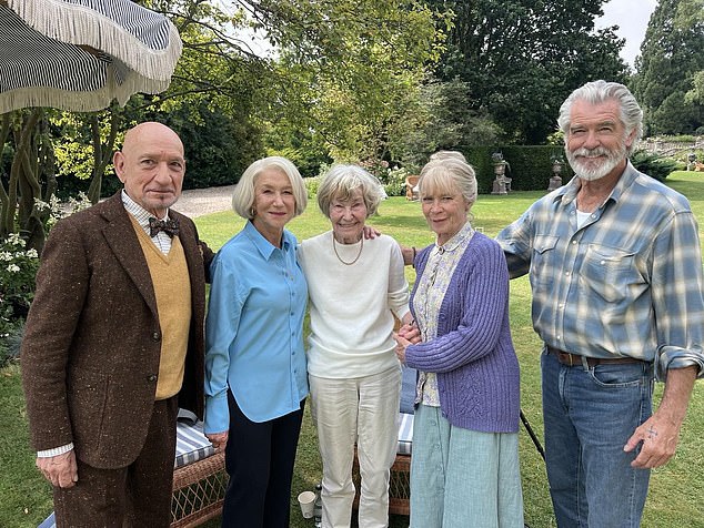 A film to die for: Pierce Brosnan, 71, shared a photo on social media of proud mother May Smith smiling alongside his veteran co-stars Sir Ben Kingsley, 80, Dame Helen Mirren, 79, and Celia Imrie, 72