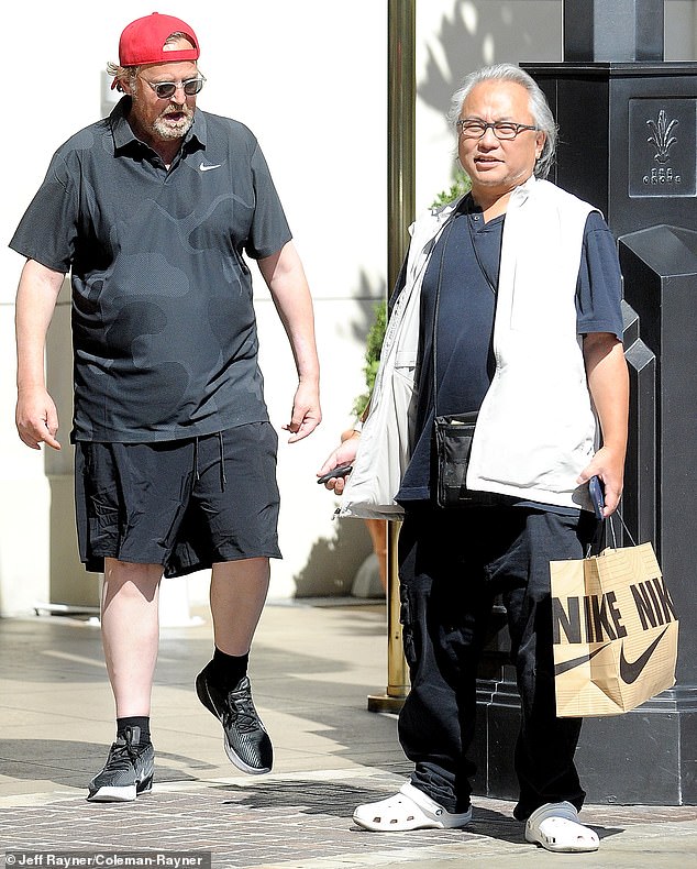 Matthew Perry with assistant Kenny Iwamasa, who injected him with drugs