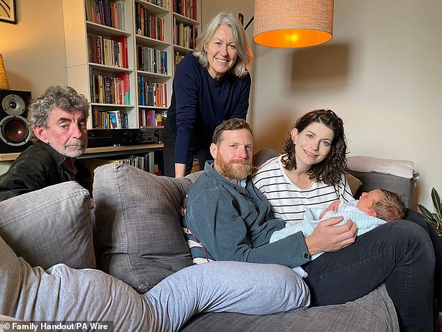 Mr Doherty's family have now appealed for help in gaining access to his Apple account, as they believe this information will be revealed (pictured left to right: Tom Doherty, his wife Anne, son-in-law Tim Hughes and daughter Rachel Doherty)