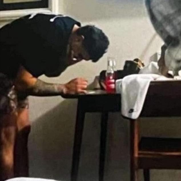 A leading lawyer has explained why the NRL is unlikely to punish Latrell Mitchell over a photo which appears to show him with an unknown white powder on a table (pictured) - unless the Rabbitohs star admits to alleged misconduct