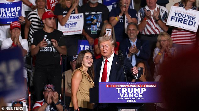 Donald Trump took to the stage at a rally in Harrisburg, Pennsylvania, to bring out the staffer who captured the image that caused him to turn his head and likely escape death during his rally in Butler, Pennsylvania earlier this month