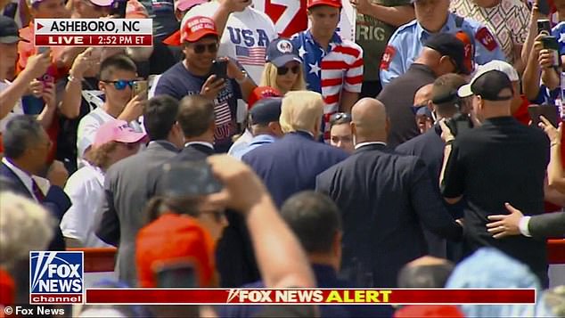 Trump leaves the stage and heads to the crowd