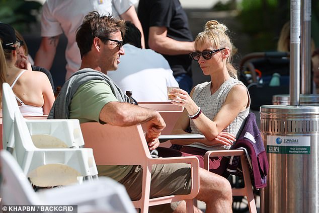 Andrew Johns and his long-term partner Kate Kendall have sparked engagement rumours after she was spotted wearing a diamond ring during a lunch in Bronte on Tuesday