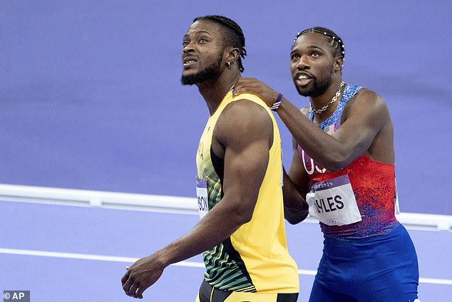 Noah Lyles (right) and Kishane Thompson nervously waited for the winner of the 100m