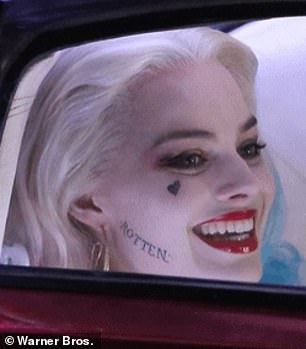 Margot put her own spin on the wacky antiheroine with pink and blue dyed hair and face tattoos in what has become an unforgettable costume that has inspired many Halloween outfits