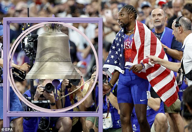 Noah Lyles of the United States rings the bell after winning the men's 100 meters final in Paris