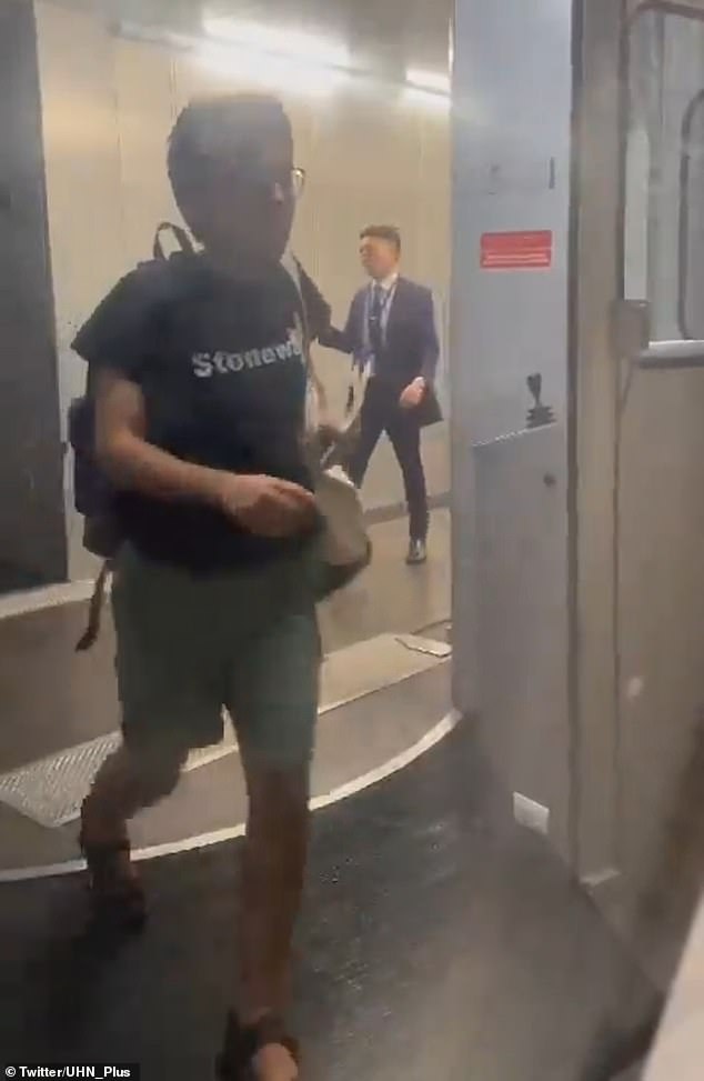 An employee at El Dorado International Airport in Bogotá, Colombia, followed the American passenger after he bypassed security protocols and walked down the walkway before attempting to kick in the door of a LATAM plane