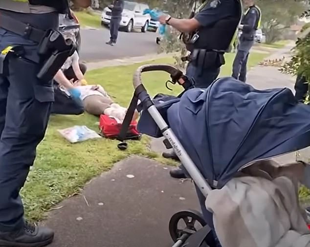 On Friday afternoon, a new mother (pictured lying on the ground) was brutally mauled by two dogs as she pushed a stroller with her baby on her way to pick up another child from school.