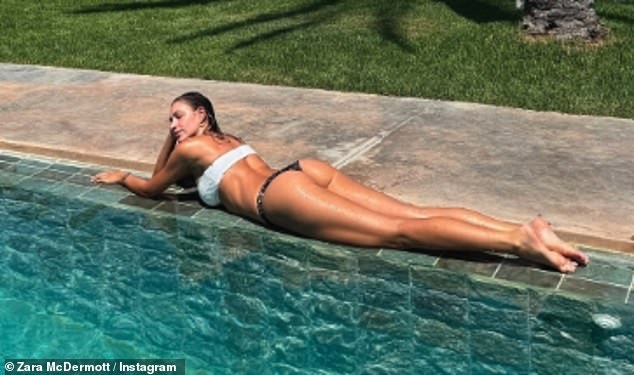 The Love Island star showed off her stunning figure in a chic black swimsuit before later relaxing poolside in a thong bikini