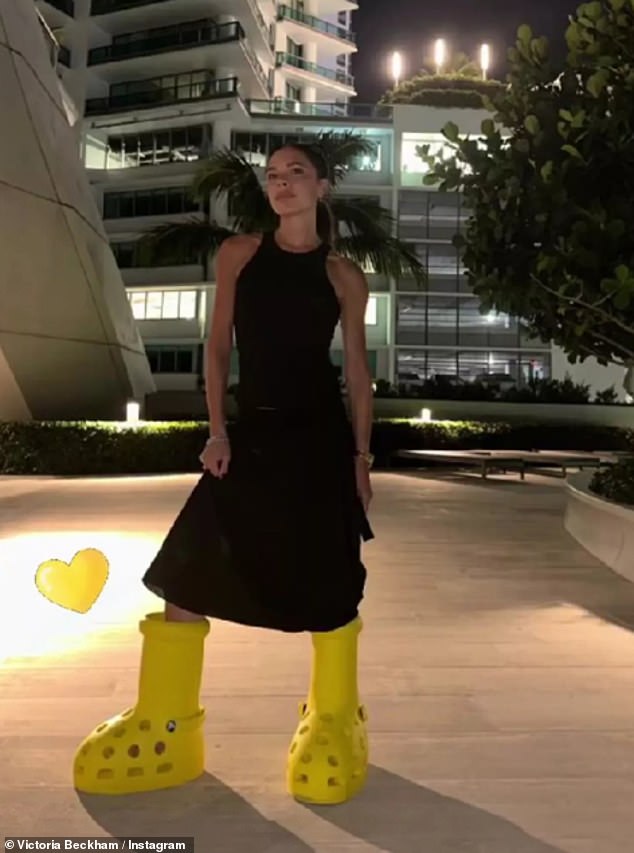 Fashion designer Victoria ditched her signature heels last year to pose in the same yellow, cartoonish, oversized boots