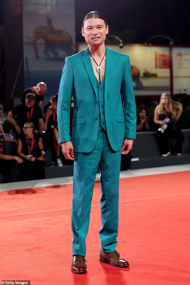 Canadian actor Phillip Forest Lewitski, 27, was also on the red carpet, looking quirky in a bright blue suit