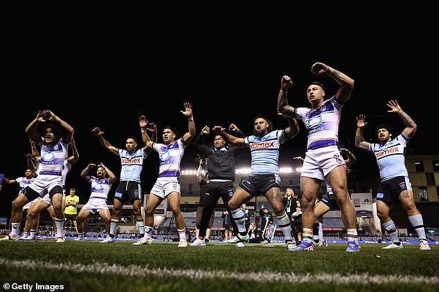 Johnson's teammates performed the Haka in honour of their retiring captain and halfback