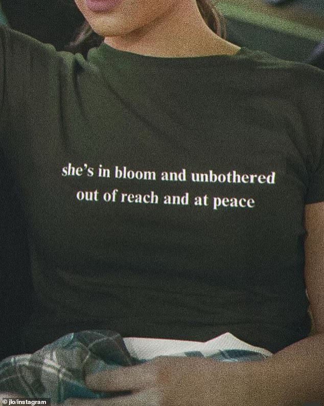 “All is unfolding in divine order,” read one meme, while another meme featured the words “she is in bloom and undisturbed beyond reach and at peace” printed on a T-shirt