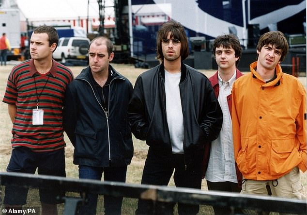 The Oasis line-up for their 1996 Knebworth Park concert, consisting of (left to right) Alan White, Paul "Bonehead" Arthurs, Liam Gallagher, Paul "Guigsy" McGuigan and Noel Gallagher