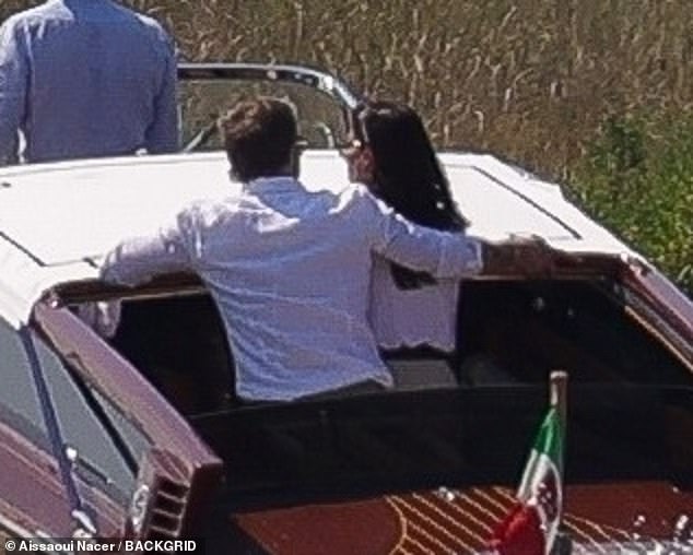 Brad put his arm around Ines during their boat ride on Saturday afternoon