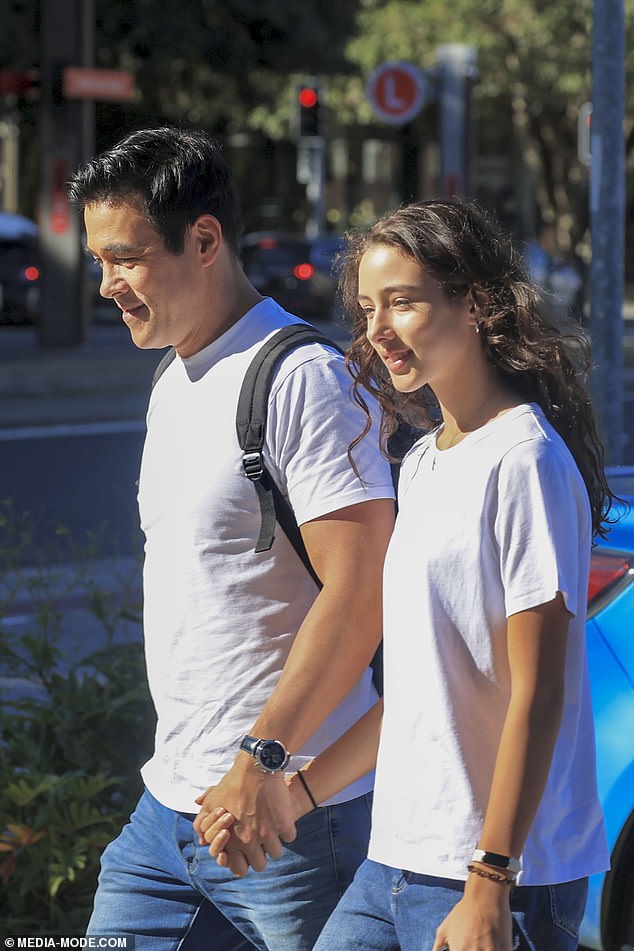 The couple wore matching ensembles as they took a morning stroll together in Sydney