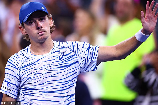 Australia's Alex de Minaur thanks the crowd after his victory over Daniel Evans