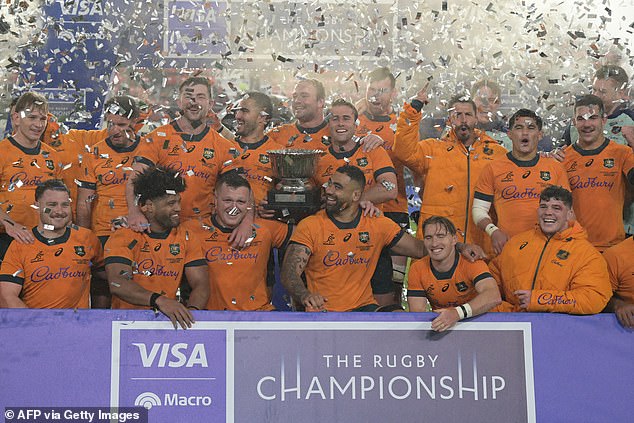 The Wallabies celebrate their defeat to Argentina's Los Pumas in the Rugby Championship