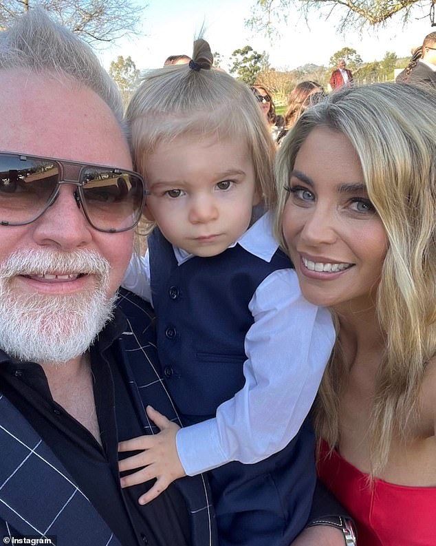 The Kyle and Jackie O show shared a photo of Kyle Sandilands with his wife Tegan and their son Otto. All pictured