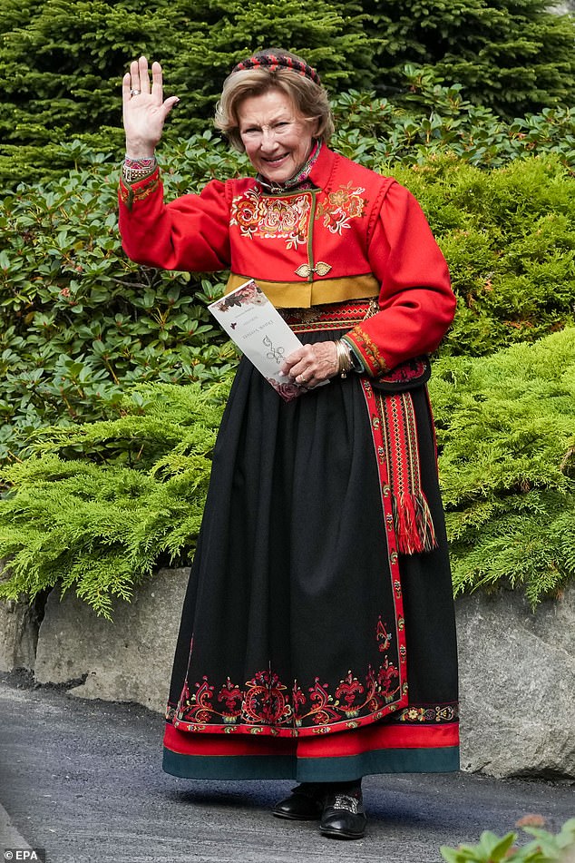 Queen Sonja of Norway waves after the wedding of Norwegian Princess Martha Louise