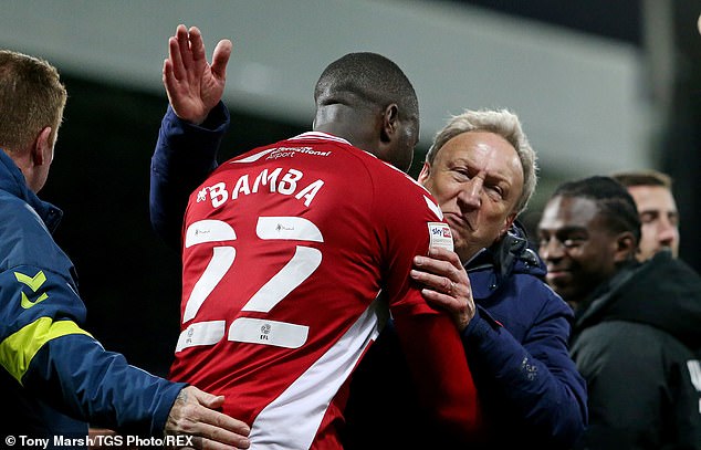 Bamba and Warnock embrace warmly during their days together in Middlesbrough