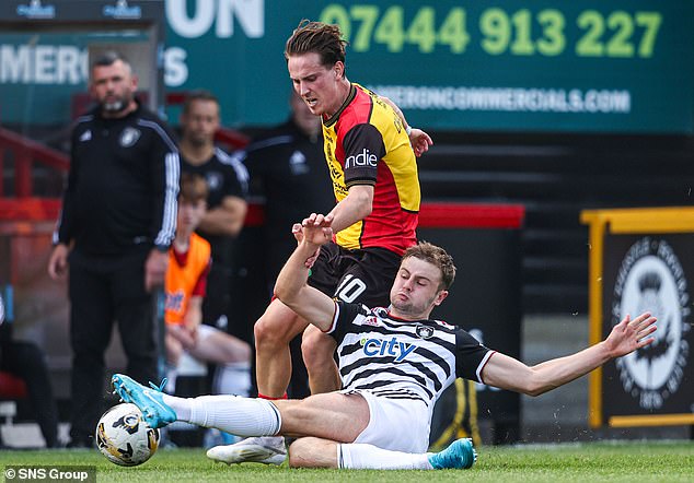 Partick Thistle's Logan Chalmers avoids the challenge of Queen's Park's Jack Turner