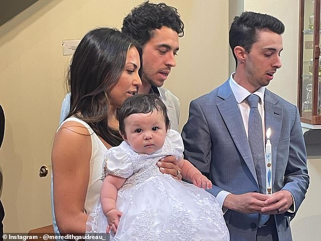 Meredith shared a series of family photos, including one from her child's baptism