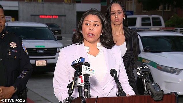 Mayor London Breed speaks with other officials after the Pearsall shooting