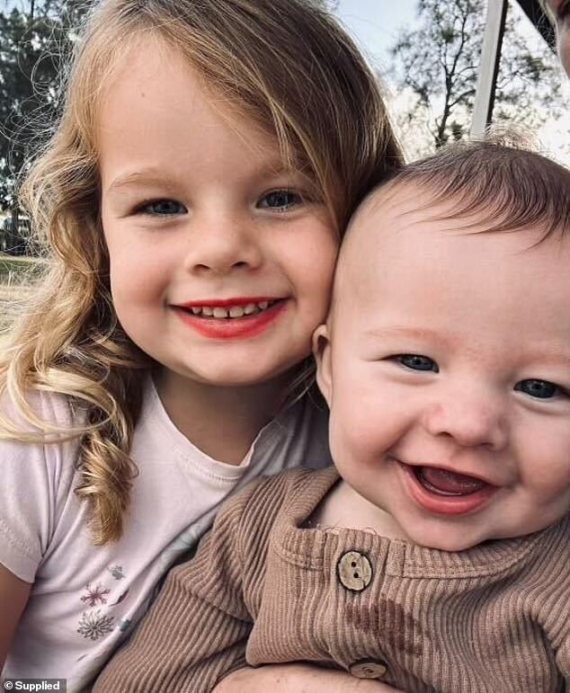 Archie's older sister Charlotte, now four, is pictured with nine-month-old Parker 'Archie' Read