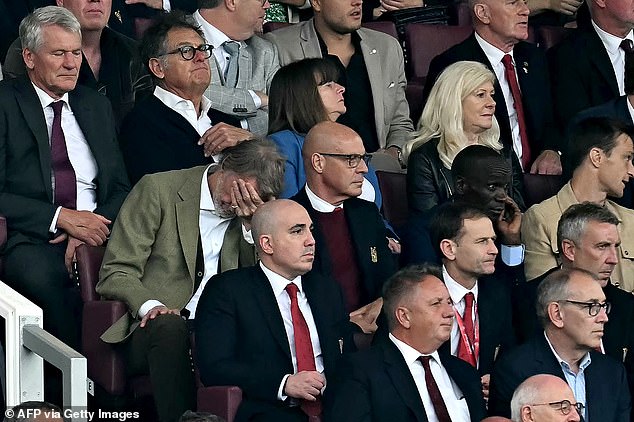 United owner Sir Jim Ratcliffe pictured (second row, left) with his head in his hands on Sunday