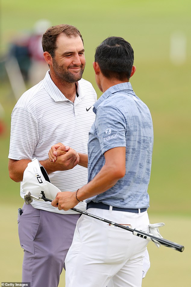 Collin Morikawa of the United States and Scottie Scheffler shake hands after the tournament