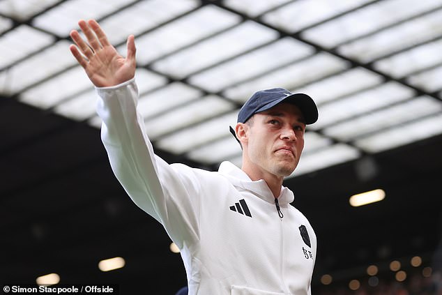 Manuel Ugarte was paraded across the field to loud applause and watched from the stands