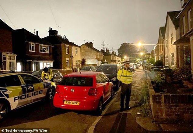 Officers believe the horrific incident on the residential street is an isolated incident and do not believe anyone else is involved. Pictured: An officer on Bremer Road